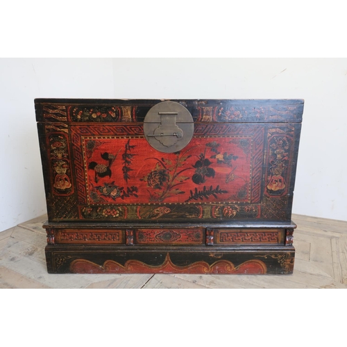 96 - Mongolian rectangular elm blanket box, the front and sides decorated with vases and flowers in lands... 