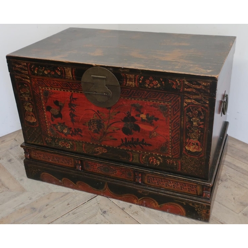 96 - Mongolian rectangular elm blanket box, the front and sides decorated with vases and flowers in lands... 