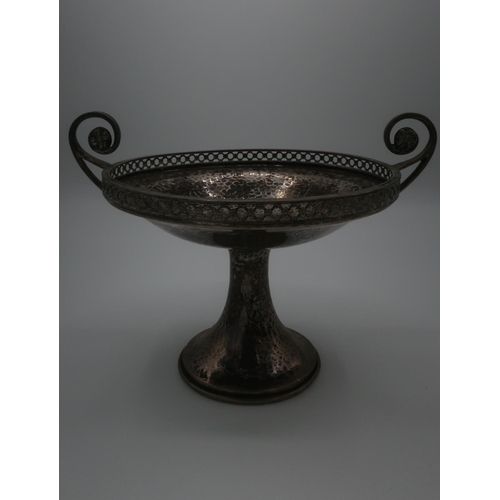 116 - George V hallmarked hammered silver tazza, with scroll handles and pierced rim on circular tapered b... 