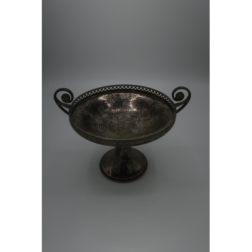 116 - George V hallmarked hammered silver tazza, with scroll handles and pierced rim on circular tapered b... 