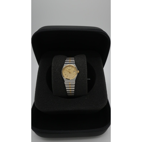 54 - Ladies Rado bi-metal quartz wrist watch with baton numerals and date, No.34830279, in original case
