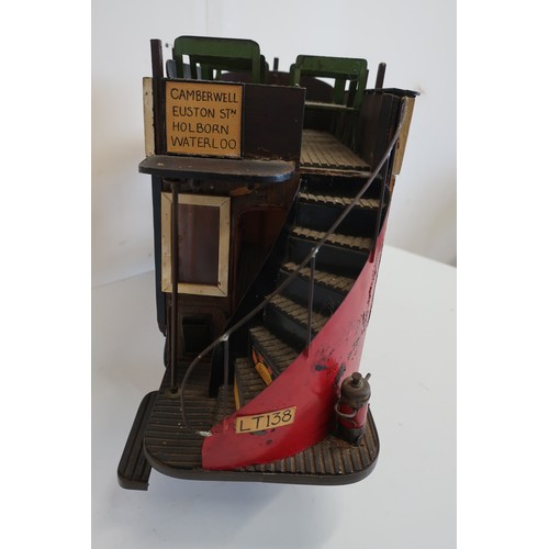 13 - Tinplate model of a vintage London bus L138, service 15C with Dewars Whisky advert, on spoked wheels... 