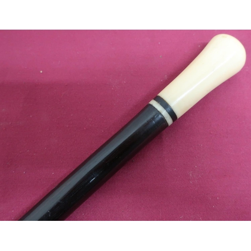 29 - Edwardian hard wood walking cane, with ivory handle and ferrule (L51cm)