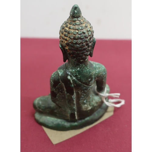 40 - Small Tibetan green patinated bronze model of a seated goddess, with gilt headdress (10cm)