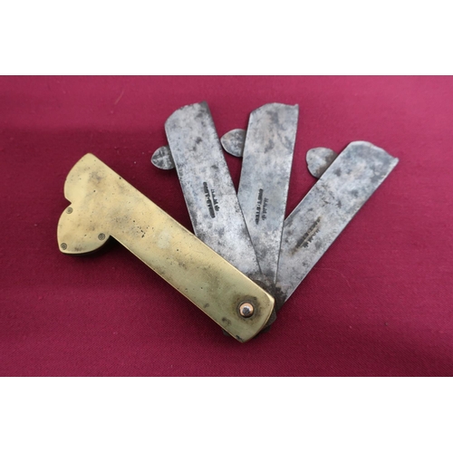 19 - Early 20th C brass Fleam, the three steel blades each stamped Ham Cast Steel (length 9.5cm)