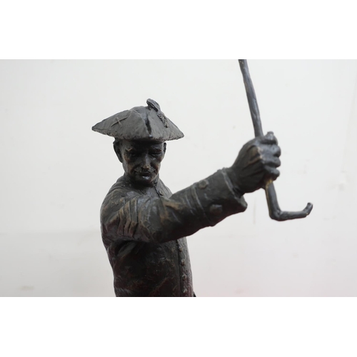 24 - The In-Pensioner, bronzed model after Philip Jackson, standing figure with raised cane  on square wo... 