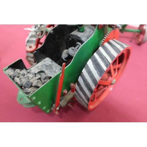 27 - Live steam model of a traction engine, probably scratch built, black and green body with red spoked ... 
