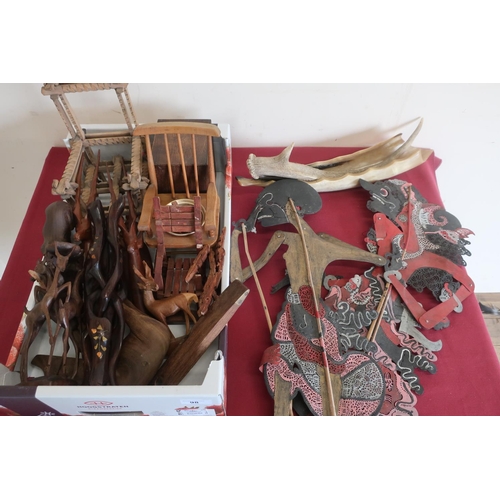 98 - Two Indonesian shadow puppets, brass bound spirit level, decorative wooden items, deer horn etc