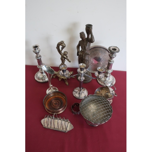 99 - Pair of EPNS candlesticks (one lacking sconce), silver plated three branch candelabra, toast rack, b... 