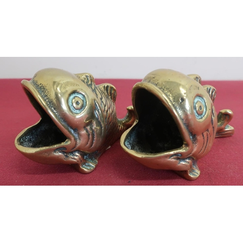 69 - Pair of Chinese bronze spoon warmers in the form of opened mouthed fish (7cm high)