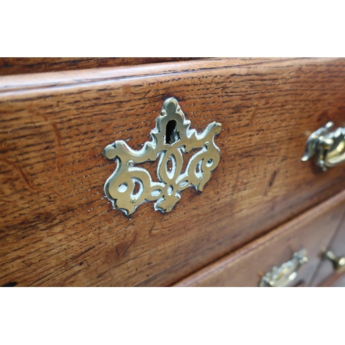 28 - George III oak dresser, twin shelf back with shaped frieze above two real and one faux drawers enclo... 