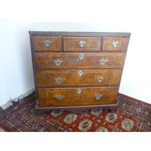 78 - 18th Century cross and herringbanded walnut chest of three short and three long drawers, with reeded... 