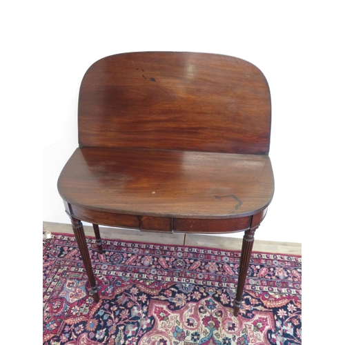 107 - Gillows style mahogany D shaped folding tea table, with reeded top and twin gate action on ring turn... 