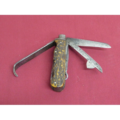 11 - Late 19th C 'Game Keepers' pocket knife with 13 tools and 16 functions and twin antler grips. An ins... 