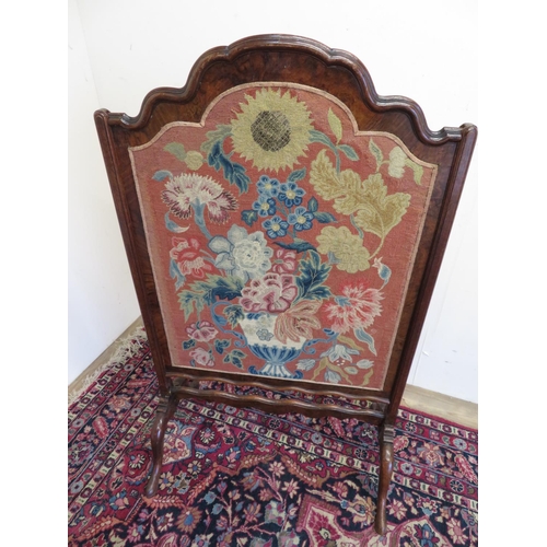 113 - Queen Anne style figured walnut framed fire screen, with stepped arched moulded top, with a wool wor... 