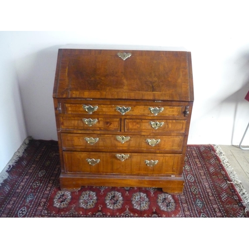 79 - Late 18th Century cross and herringbanded walnut bureau, slope fall front revealing a fitted interio... 