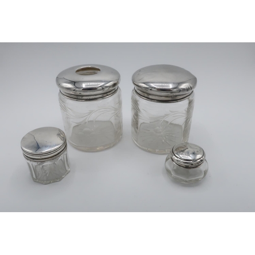 87 - Collection of Victorian and later hallmarked silver topped dressing table jars (H7.5 cm) max, London... 