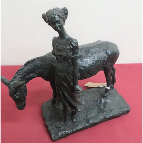 81 - Mid 20th C patinated bronze model of a young girl with a pony, on a naturalistic rectangular base (W... 