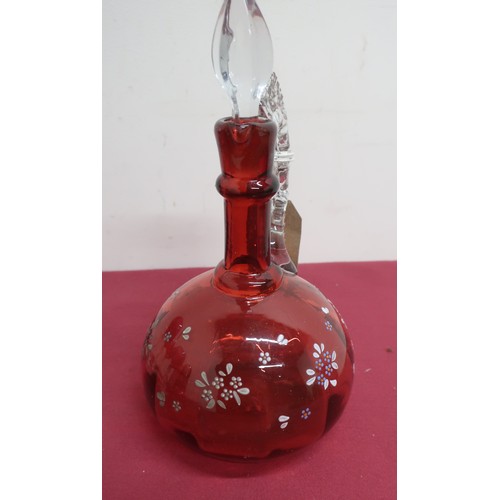 84 - Ruby glass mallet shaped decanter, the body painted with flowers, clear glass handle and stopper (H2... 