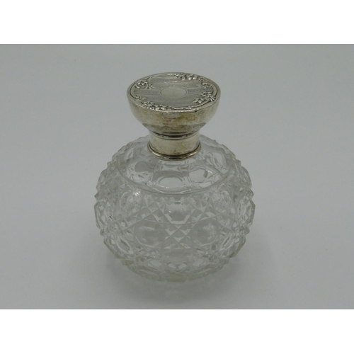 12 - Very large cut-glass, globe scent bottle with silver hallmarked top- Birmingham, 1907 (H12.5cm)