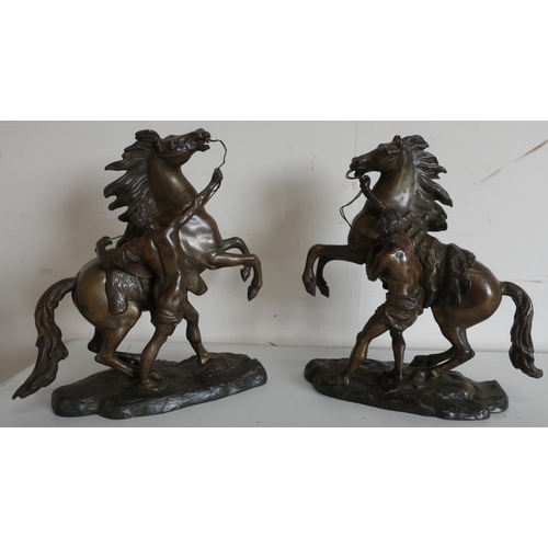 313 - Pair of small bronze models of Marley horsemen, after Cousteau, on naturalistic bases (29cm x 29cm)