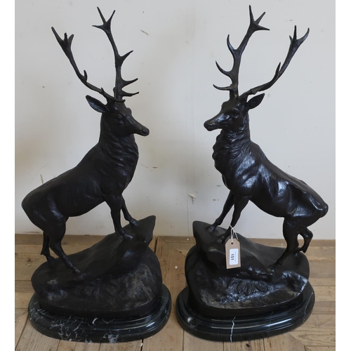 324 - Pair of patinated cast metal models of 