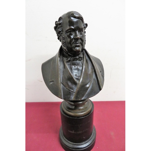 298 - A cast bronze bust of a 19th C gentleman on circular base, the reverse marked C Marochetti, on eboni... 