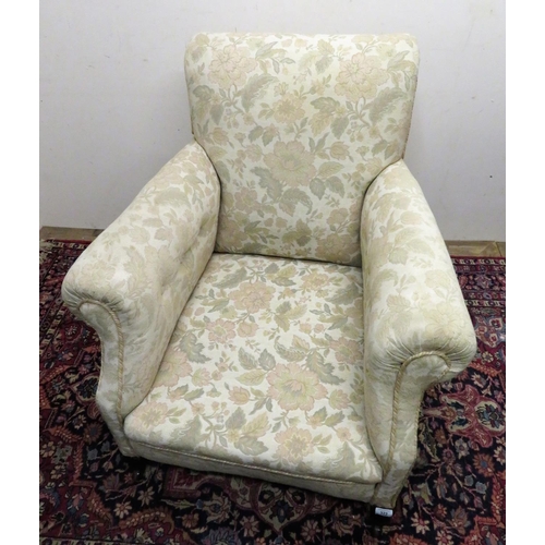 322 - Victorian upholstered armchair with shaped back and arms, on angular cabriole legs with castors