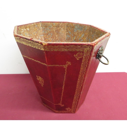 342 - Red and gilt tooled leather wastepaper bin with lion mask handle and central rampant lion detail, wi... 