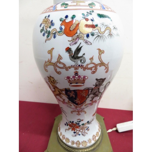 344 - Armorial ceramic vase converted to electric table lamp with elaborate brass base (cracks to rim) (H6... 