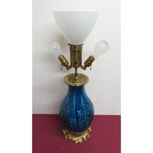 353 - Large relief moulded baluster blue glazed three light table lamp, gilt metal top cast with grape vin... 