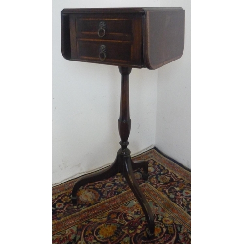 54 - Small Geo. III style cross banded mahogany tripod Pembroke table, reeded top above two small drawers... 