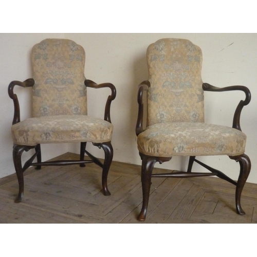 55 - Pair of Queen Anne style open arm chairs with upholstered arched backs, bow front seats and shepherd... 