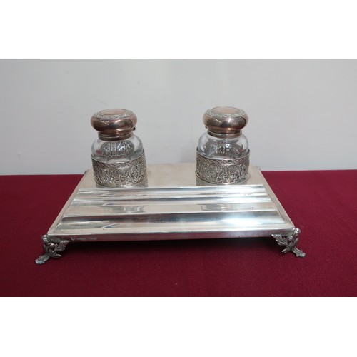 1 - 20th C continental silver rectangular inkstand, the two clear glass wells with hinged silver tops, o... 