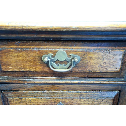 75 - Titchmarsh and Goodwin cabinet makers of Ipswich: an oak twin pedestal desk, moulded rectangular top... 