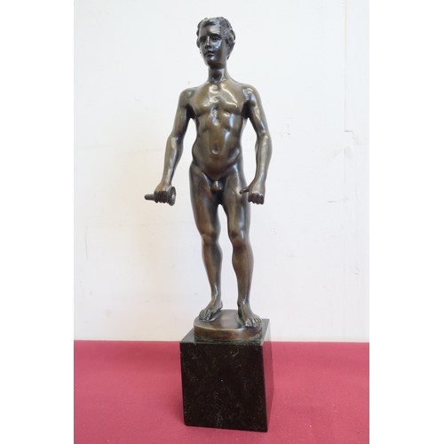 299 - A bronze figure of a naked man wearing roman style laurel to the head with remains of sword in his g... 