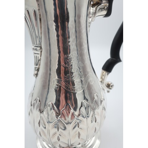 338 - Geo. lll hallmarked silver coffee pot, baluster body relief decorated with leafage and crest, unmark... 