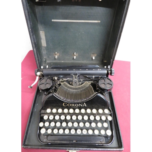 159 - Corona four portable typewriter with qwerty keyboard in fitted case