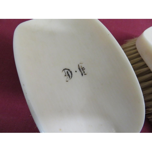 268 - Pair of ivory monogrammed hairbrushes dated 1937 and 1938, (2)