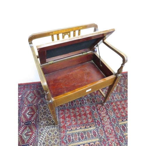 369 - Edwardian inlaid mahogany piano stool with raised back and hinged upholstered seat on square taperin... 