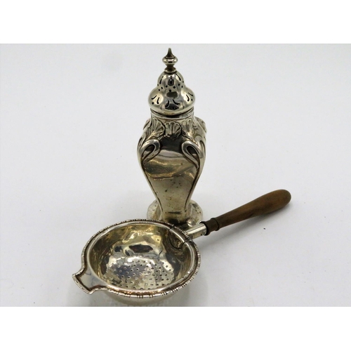 38 - Geo. V Art Nouveau design silver pepperette Birmingham 1913, a Geo. V silver tea strainer with turne... 