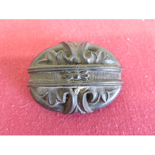 40 - Victorian carved jet brooch, a continental white metal brooch stamped 1896 with rubbed bright cut de... 