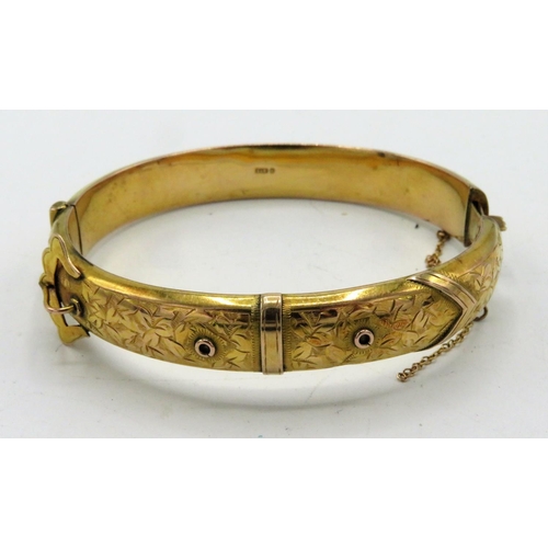 43 - Victorian 9ct gold hinged bangle with bright coloured decoration