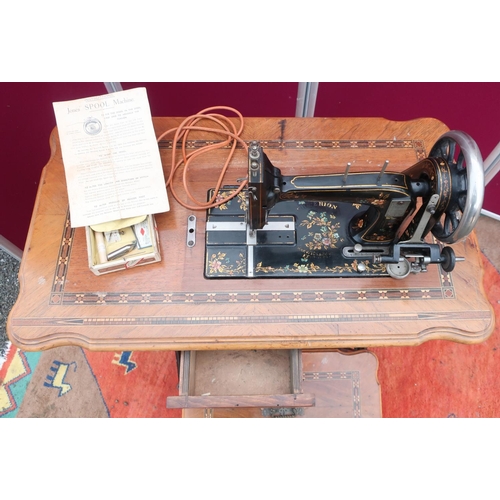 259 - Barwick & Haggas, Keighley 'Criterion' treadle sewing machine with belt, cast iron base with inlaid ... 