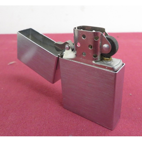 484 - A Zippo 1993 style brushed metal lighter (H6cm), in original case with instructions, etc