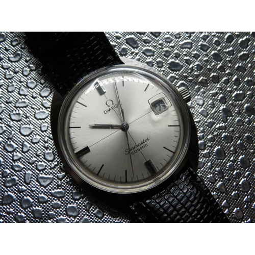 516 - Omega Seamaster Cosmic hand wound wristwatch with date. Stainless steel case on leather strap.  Case... 