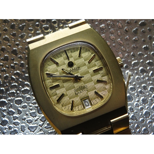 520 - Roamer Rockshell Anfibio Matic Wristwatch with date. Gold plated case and bracelet. Case back stampe... 