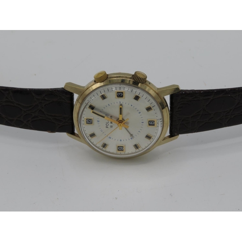 525 - Poljot hand wound wristwatch alarm. Gold plated case on leather strap, 18 jewel movement