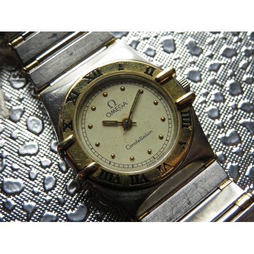 532 - Omega lady’s Constellation quartz wristwatch. Stainless steels case with gold plated bezel matching ... 