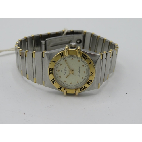 532 - Omega lady’s Constellation quartz wristwatch. Stainless steels case with gold plated bezel matching ... 